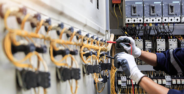 Professional Electrician technician working in Santa Claus, IN